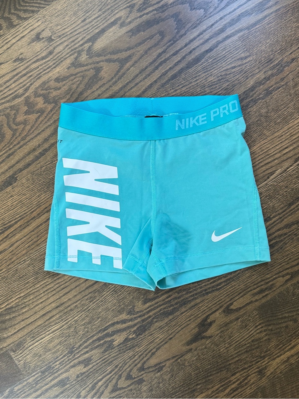 Nike Teal Athletic Compression Shorts with White Logo